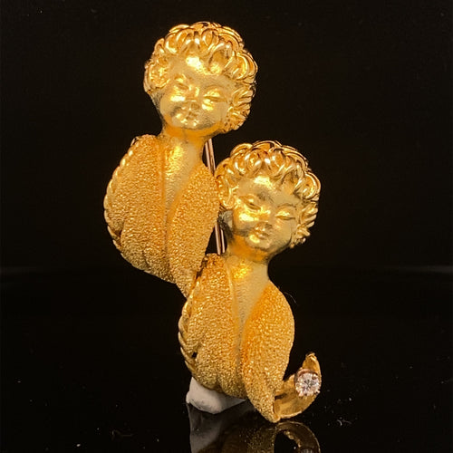 gold pin brooch jewelry zodiac sign van cleef arpels gemini